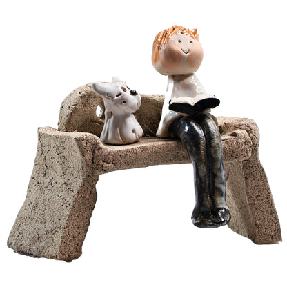 Handmade Ceramic Figurine of Man Reading with Scottie Dog on Bench